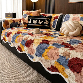 Housse de canapé en fausse fourrure de lapin, douce, antidérapante, de forme irrégulière et colorée.