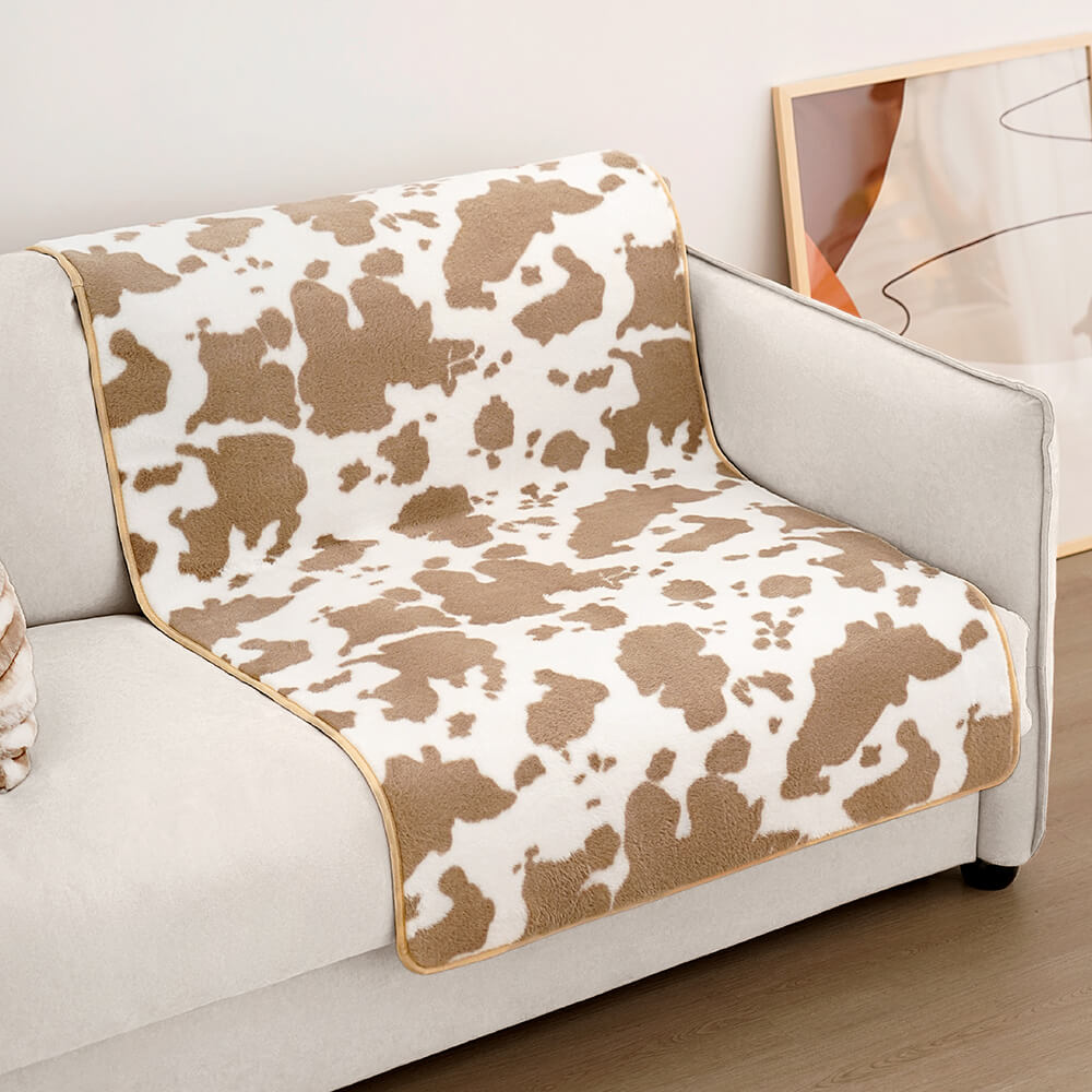 Tapis douillet à motif de vache pour animaux de compagnie